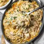 Easy Chicken Tetrazzini 8 Delicious easy chicken tetrazzini served in a bowl with herbs on top