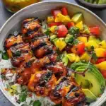 Grilled Maple Sriracha Chicken Bites with Coconut Rice and Mango Avocado Salsa 31 Grilled Maple Sriracha Chicken Bites served with Coconut Rice and Mango Avocado Salsa
