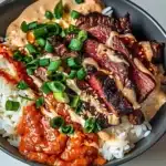 Korean BBQ Steak Rice Bowls 34 Korean BBQ steak rice bowls with fresh vegetables and flavorful sauce.