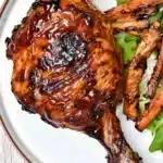 Barbecue Chicken Leg Quarters 5 Juicy barbecue chicken leg quarters sizzling on the grill