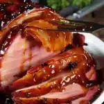 Brown Sugar Mustard Glazed Ham 10 Brown sugar mustard glazed ham on a serving platter