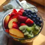 Fruit Salad with Honey Lime Dressing 11 Colorful fruit salad with honey lime dressing in a bowl
